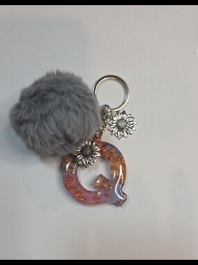 Gray Pom Pom Keychain with Pink Resin 'Q' Charm and Sunflower Accents